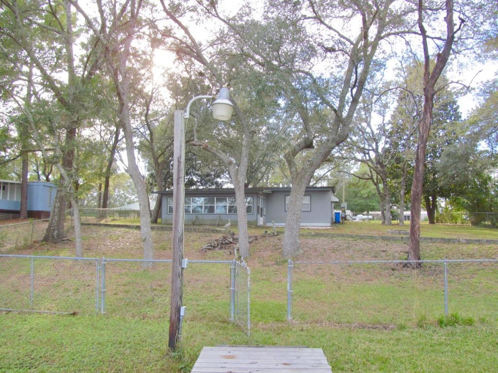 174 Red Eye Road DeFuniak Springs, FL 32433 - Photo 6 of 15 LOOKING AT BACK OF HOUSE