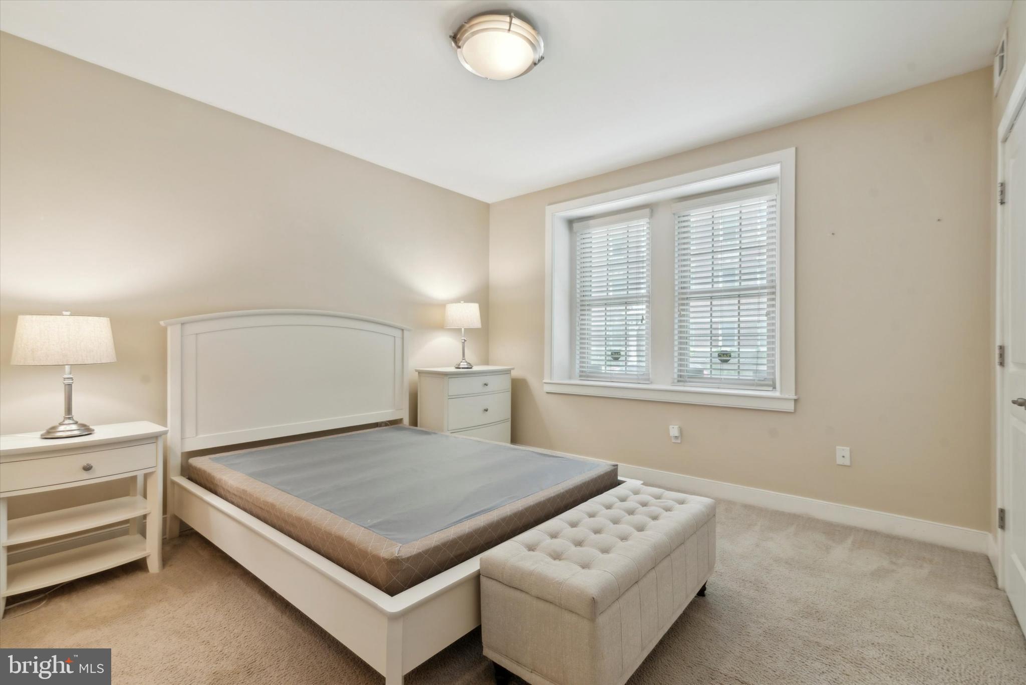 4300 Spruce Street, Unit A101 Philadelphia, PA 19104 - Photo 15 of 25 a living room with furniture and a table