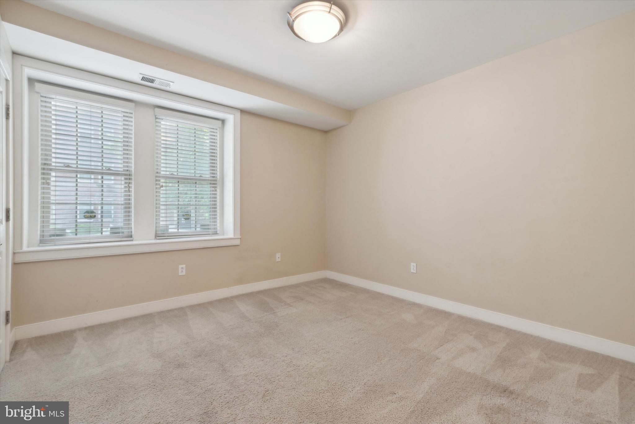 4300 Spruce Street, Unit A101 Philadelphia, PA 19104 - Photo 18 of 25 an empty room with a window
