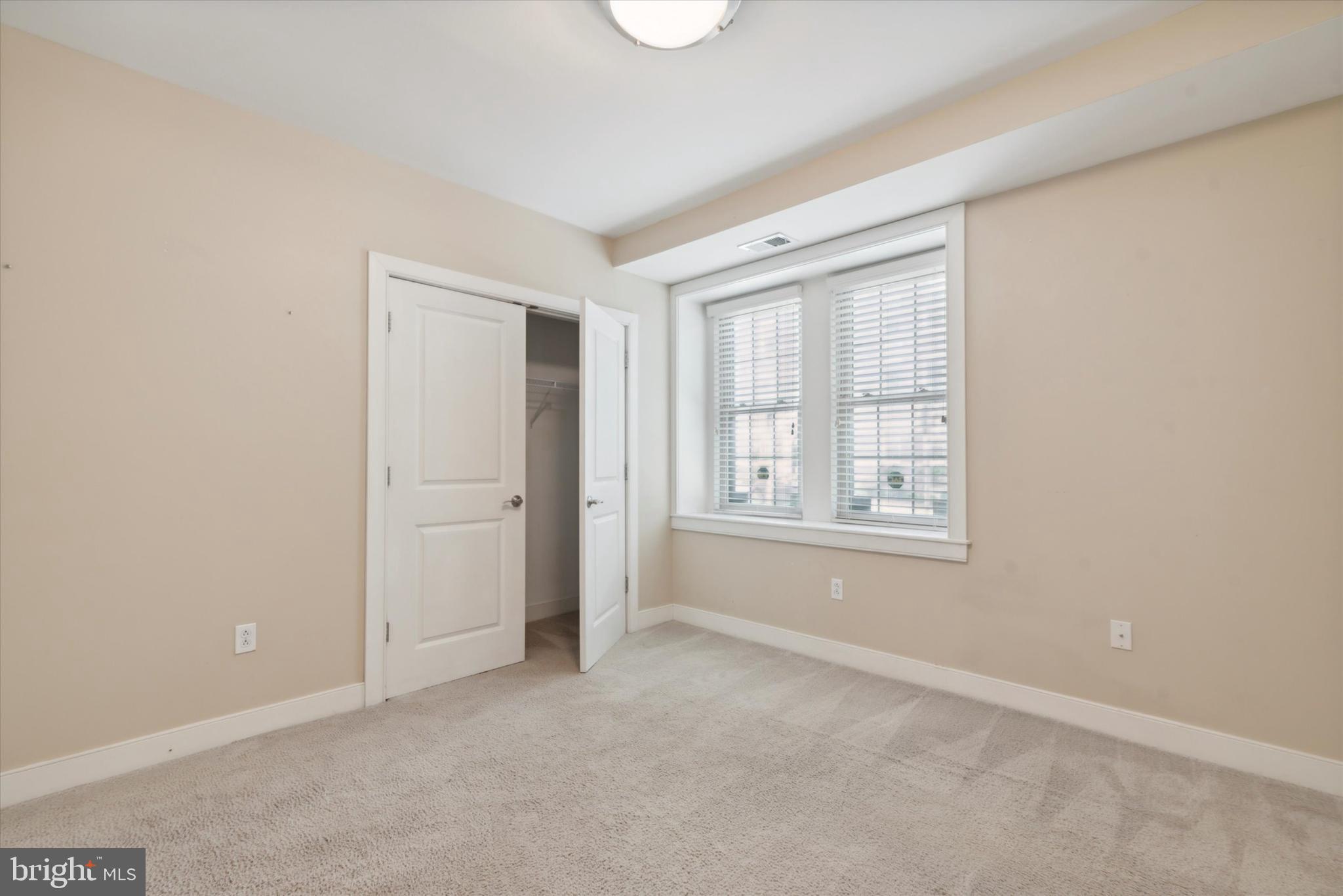4300 Spruce Street, Unit A101 Philadelphia, PA 19104 - Photo 20 of 25 a view of an empty room with a window