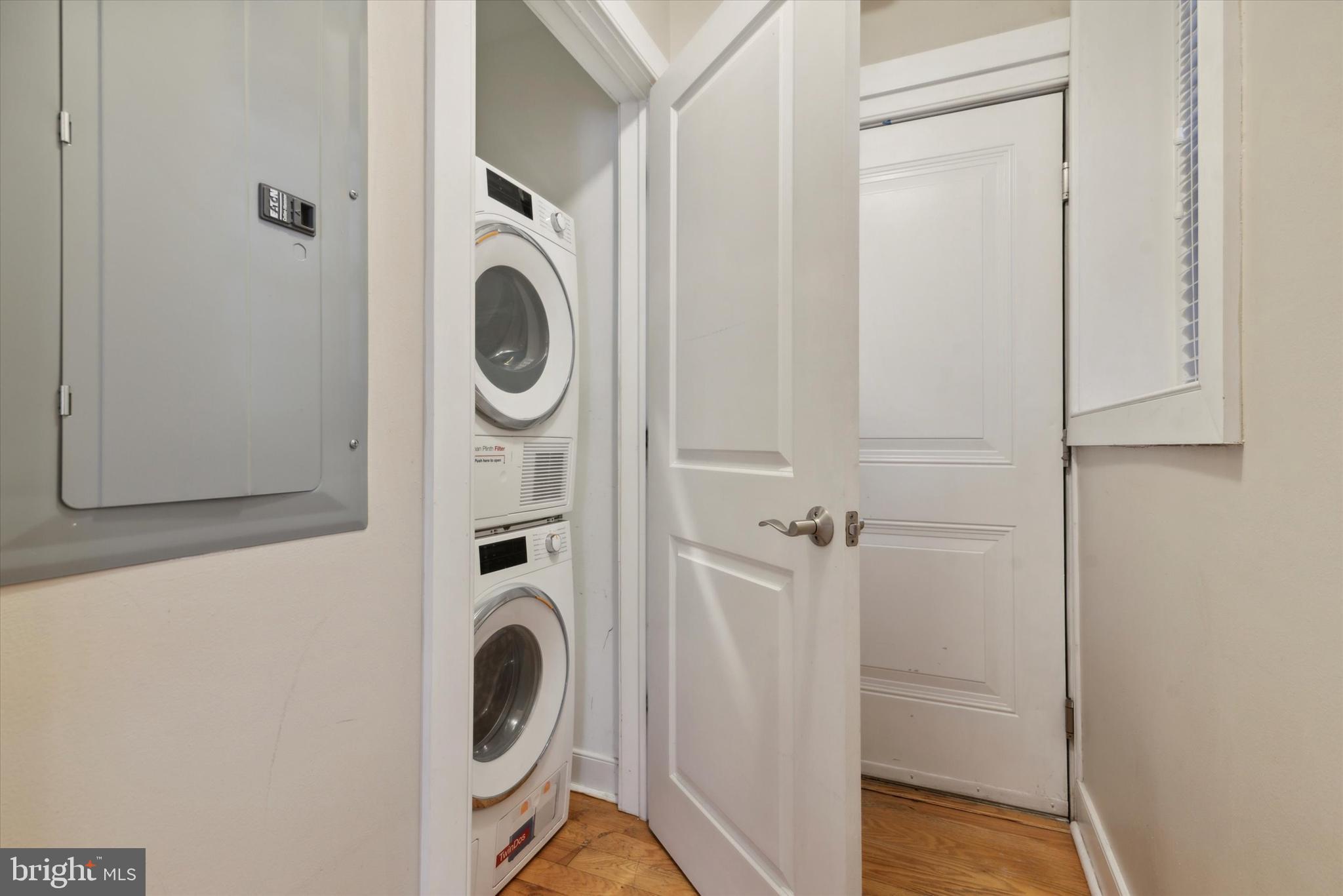 4300 Spruce Street, Unit A101 Philadelphia, PA 19104 - Photo 22 of 25 a view of a storage & utility room with washer and dryer