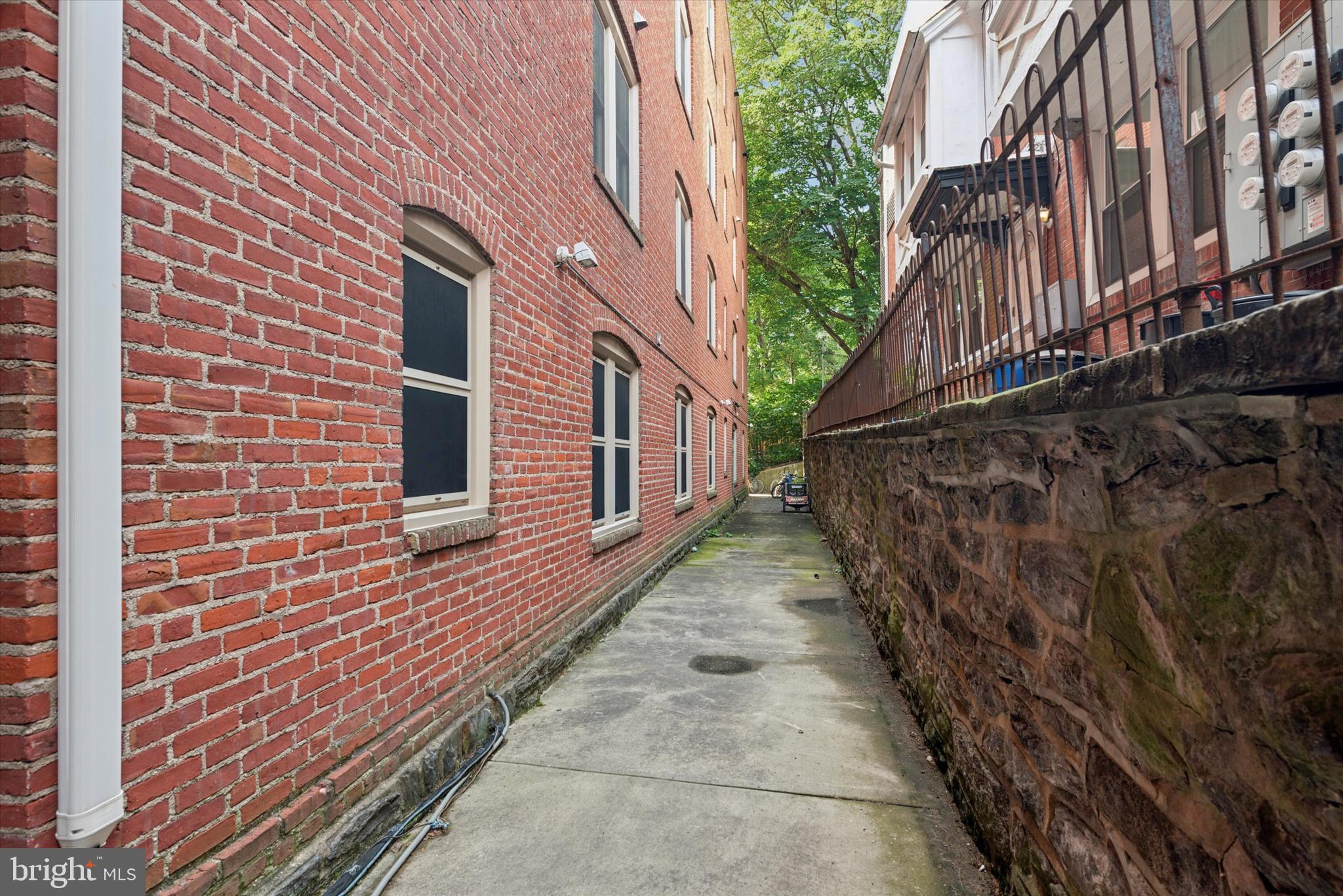 4300 Spruce Street, Unit A101 Philadelphia, PA 19104 - Photo 24 of 25 a view of a pathway with a house