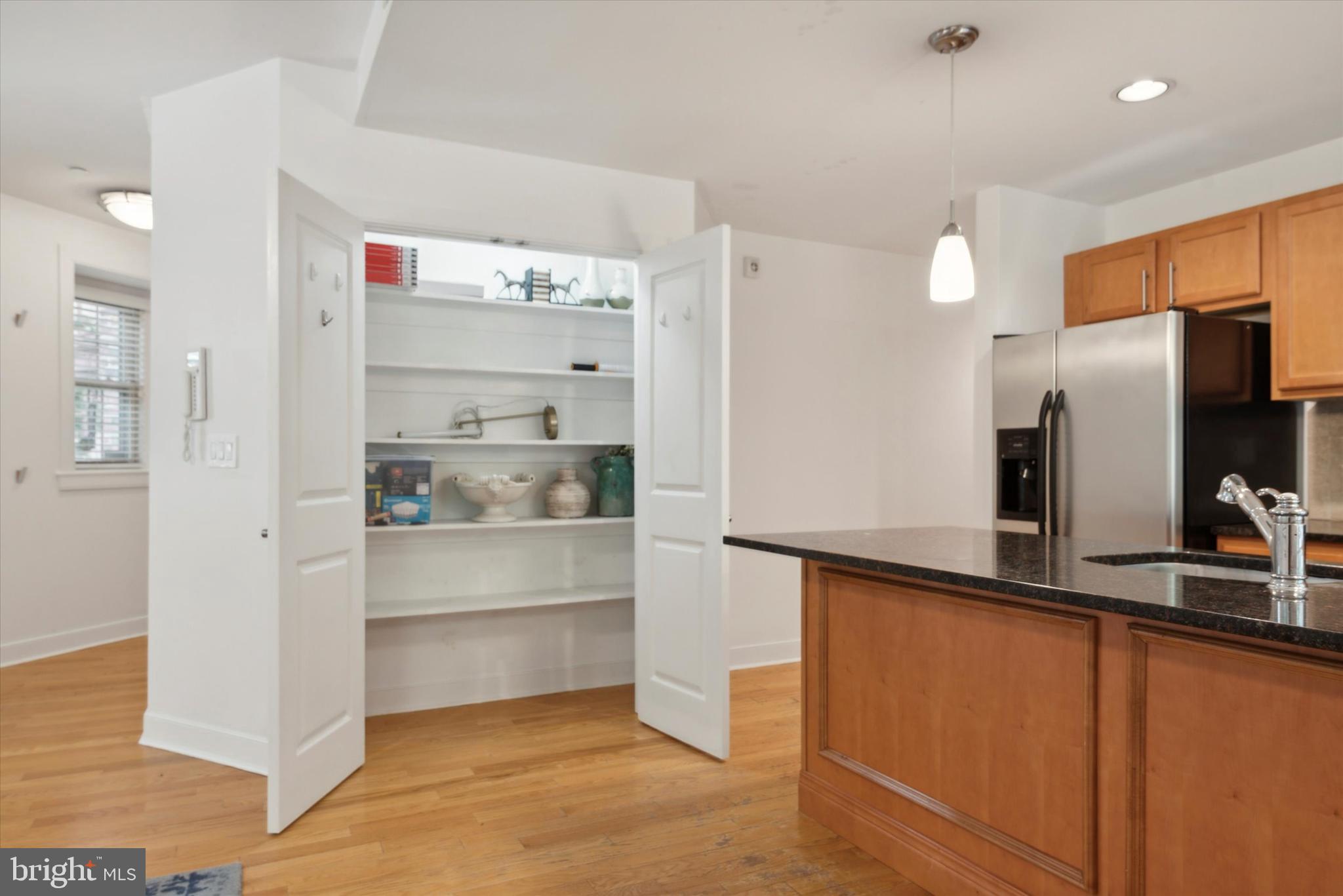 4300 Spruce Street, Unit A101 Philadelphia, PA 19104 - Photo 10 of 25 a view of a kitchen with refrigerator and stove