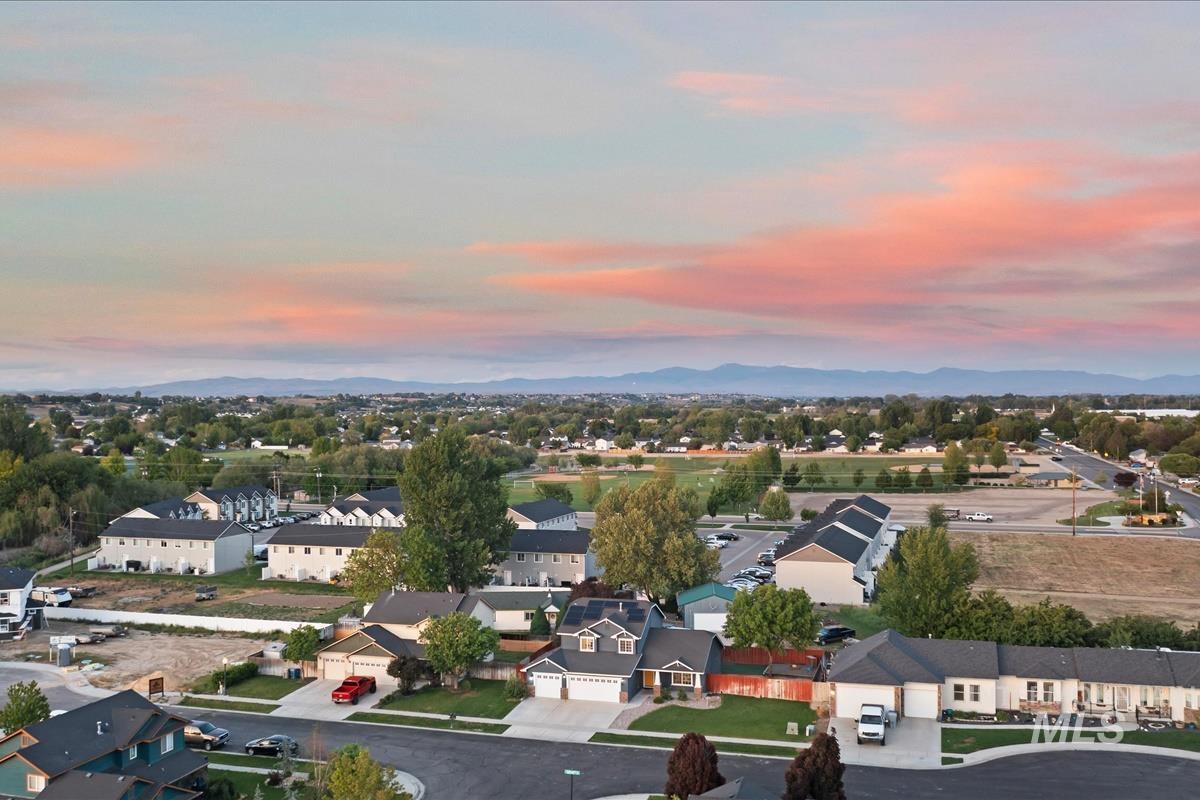 80 Cobblestone Court Middleton, ID 83644 - Photo 43 of 48 Aerial perspective showcasing a residential neighborhood with varied architectural styles