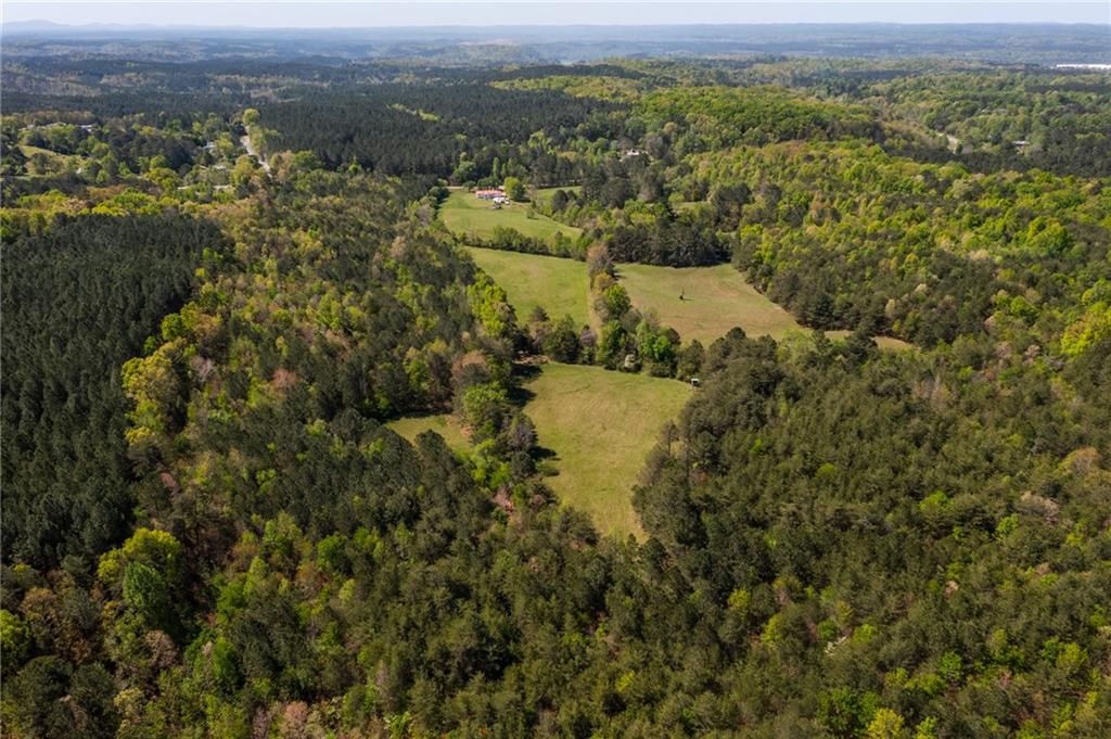 7596 Red Bud Road Northeast Ranger, GA 30734 - Photo 14 of 47 a view of a town with mountains in the background