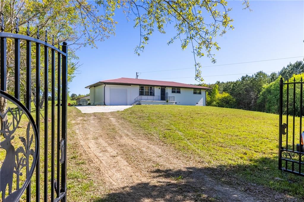 7596 Red Bud Road Northeast Ranger, GA 30734 - Photo 16 of 47 a view of swimming pool with a yard