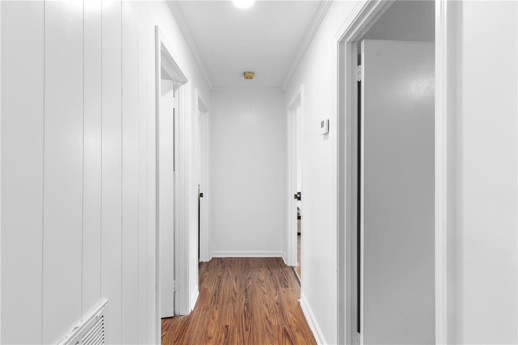 7596 Red Bud Road Northeast Ranger, GA 30734 - Photo 34 of 47 a view of a hallway with wooden floor