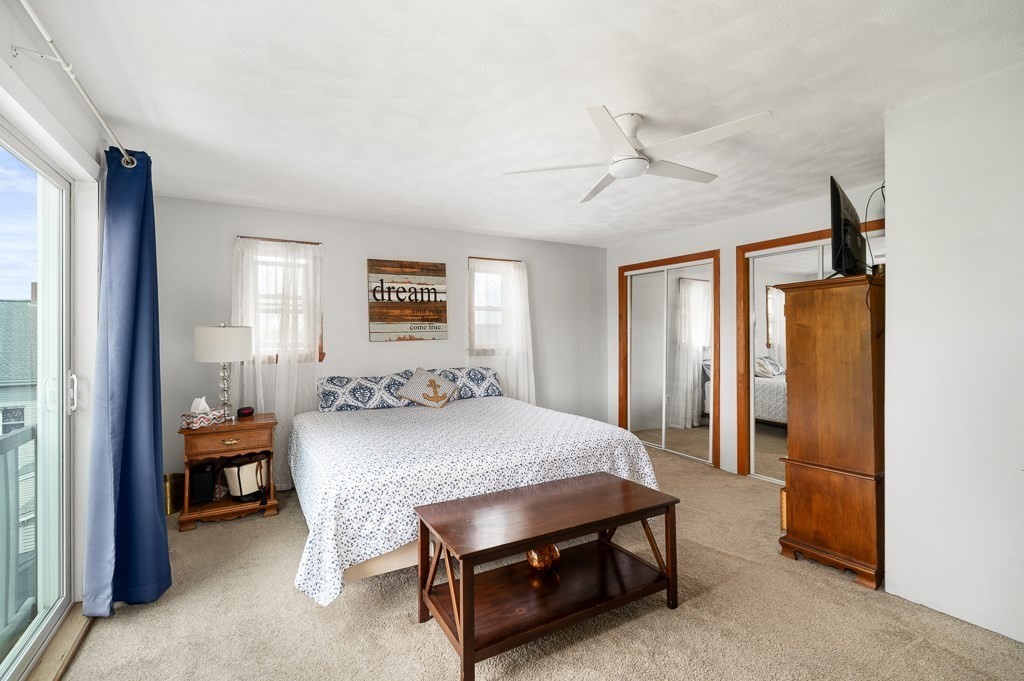 9 Alpine Court Gloucester, MA 01930 - Photo 20 of 32 a bed room with a bed and a window