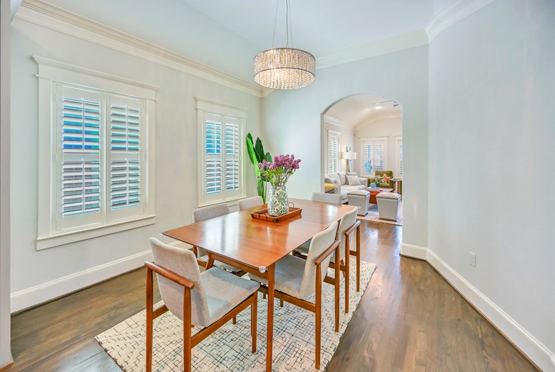 1122 East 23rd Street Houston, TX 77009 - Photo 9 of 23 Light-filled dining space with designer lighting and effortless connection to kitchen and living areas.