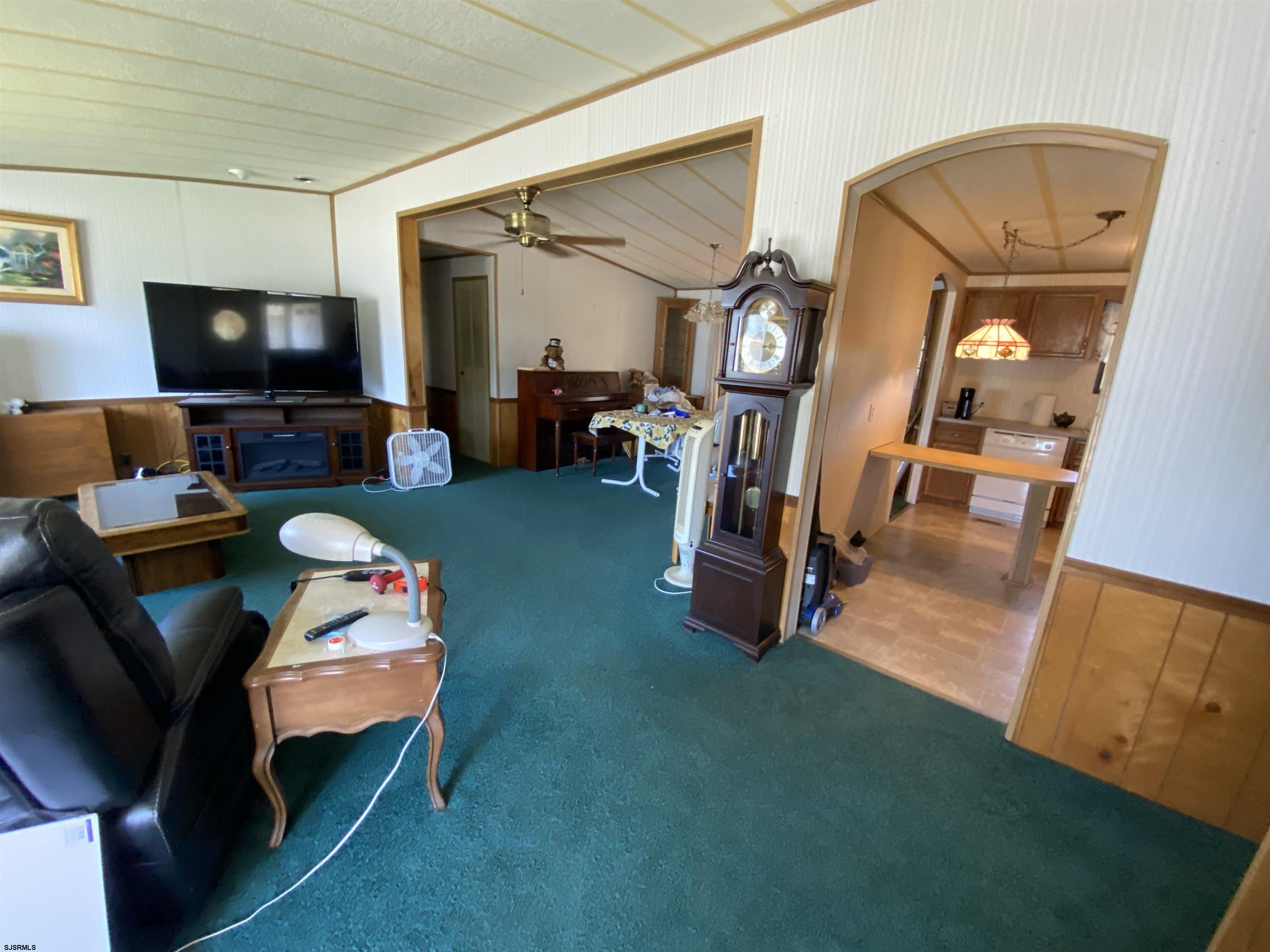 346 Puritan Drive Buena, NJ 08310 - Photo 12 of 22 a living room with furniture and a flat screen tv