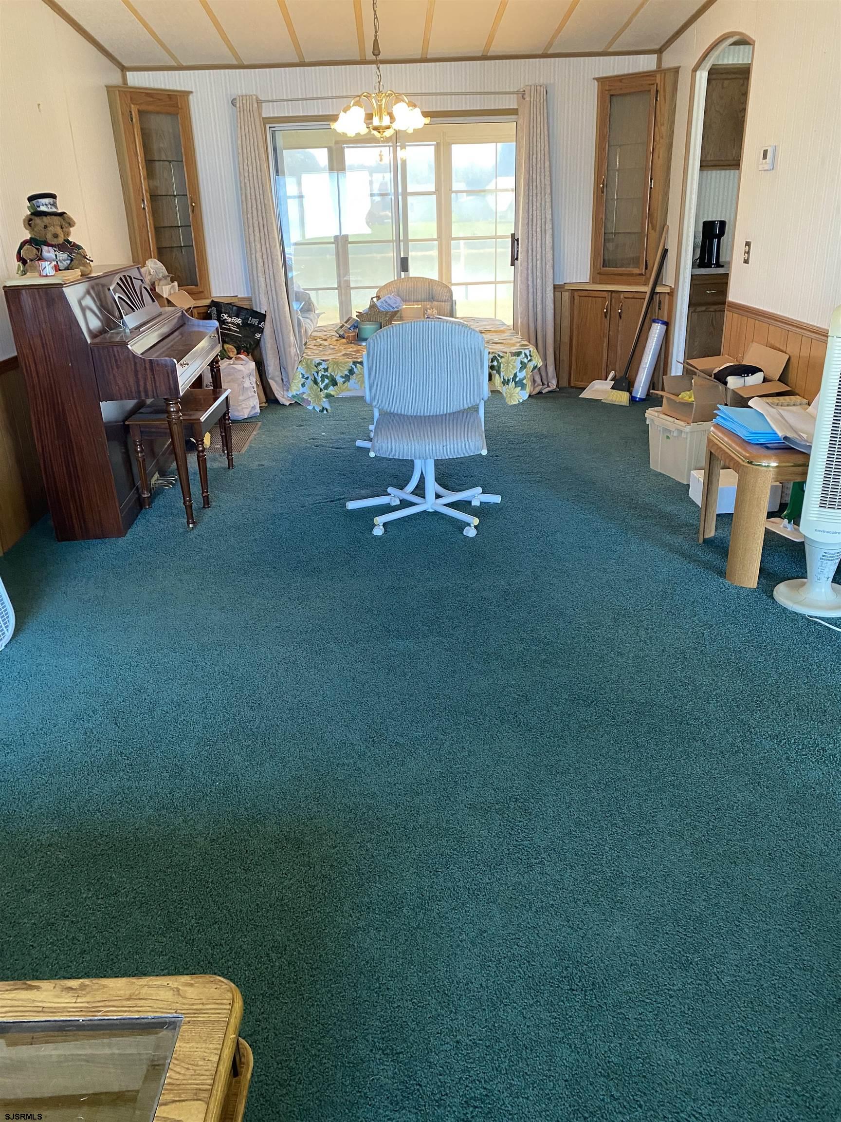 346 Puritan Drive Buena, NJ 08310 - Photo 13 of 22 a living room with furniture and a flat screen tv