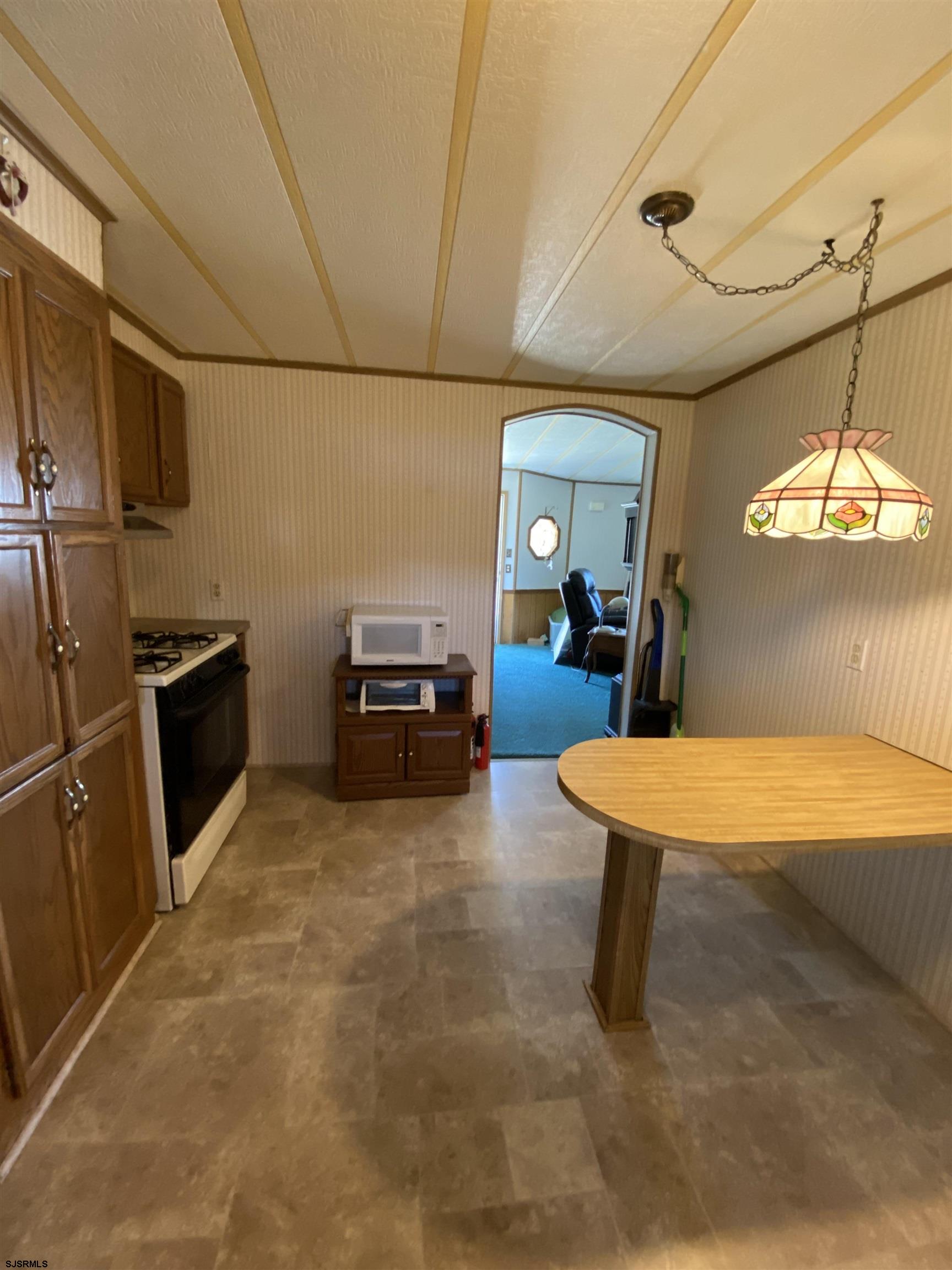 346 Puritan Drive Buena, NJ 08310 - Photo 16 of 22 a room with furniture and a kitchen