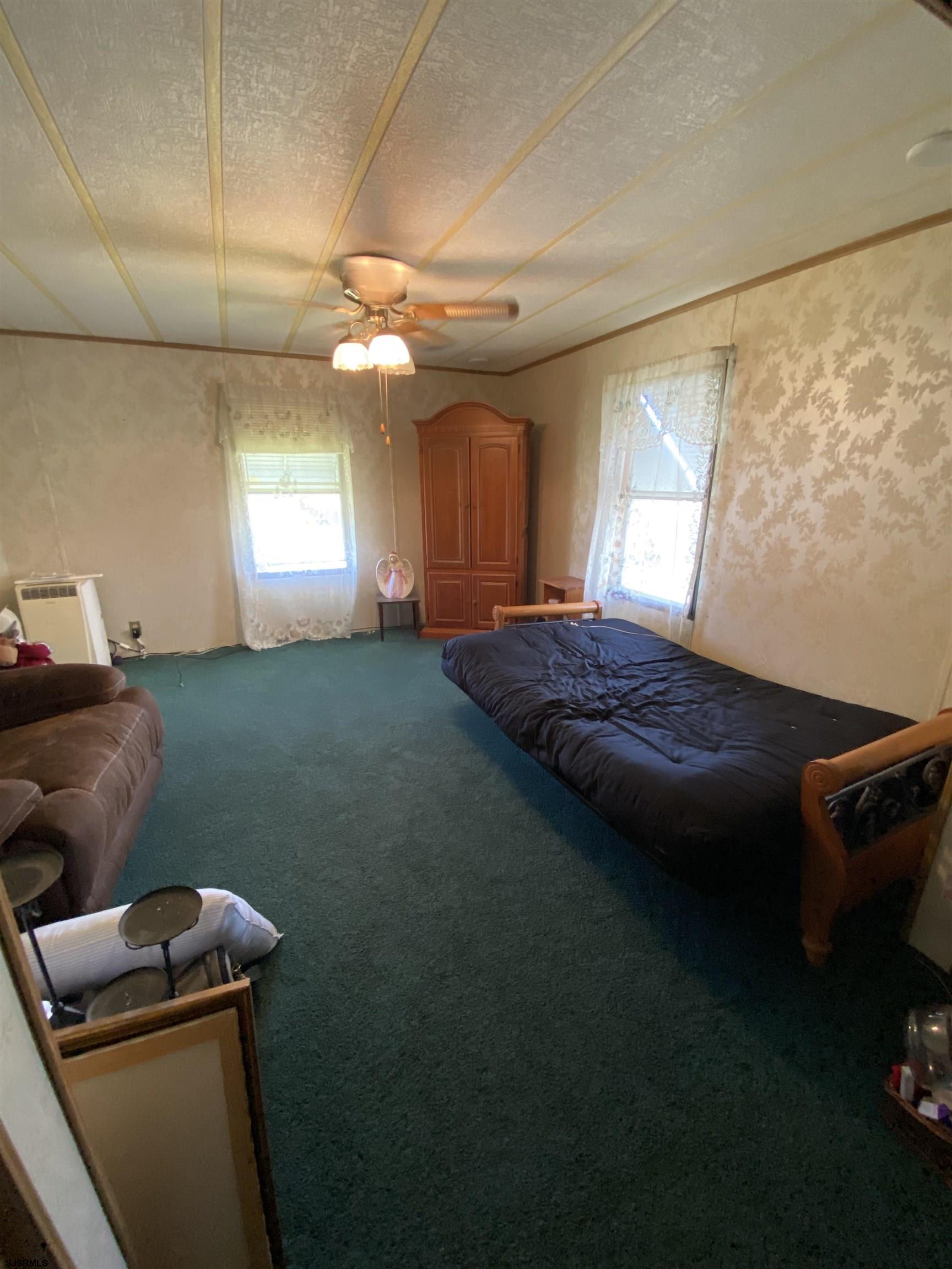 346 Puritan Drive Buena, NJ 08310 - Photo 18 of 22 a bedroom with a bed and a window
