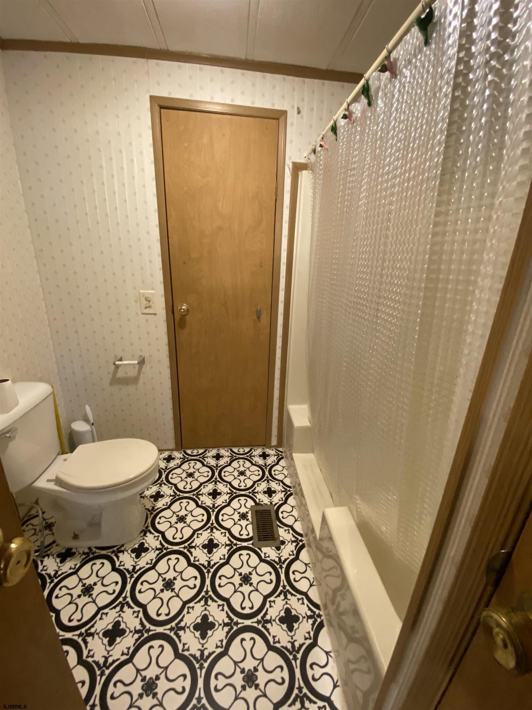 346 Puritan Drive Buena, NJ 08310 - Photo 20 of 22 a bathroom with a granite countertop shower and a toilet