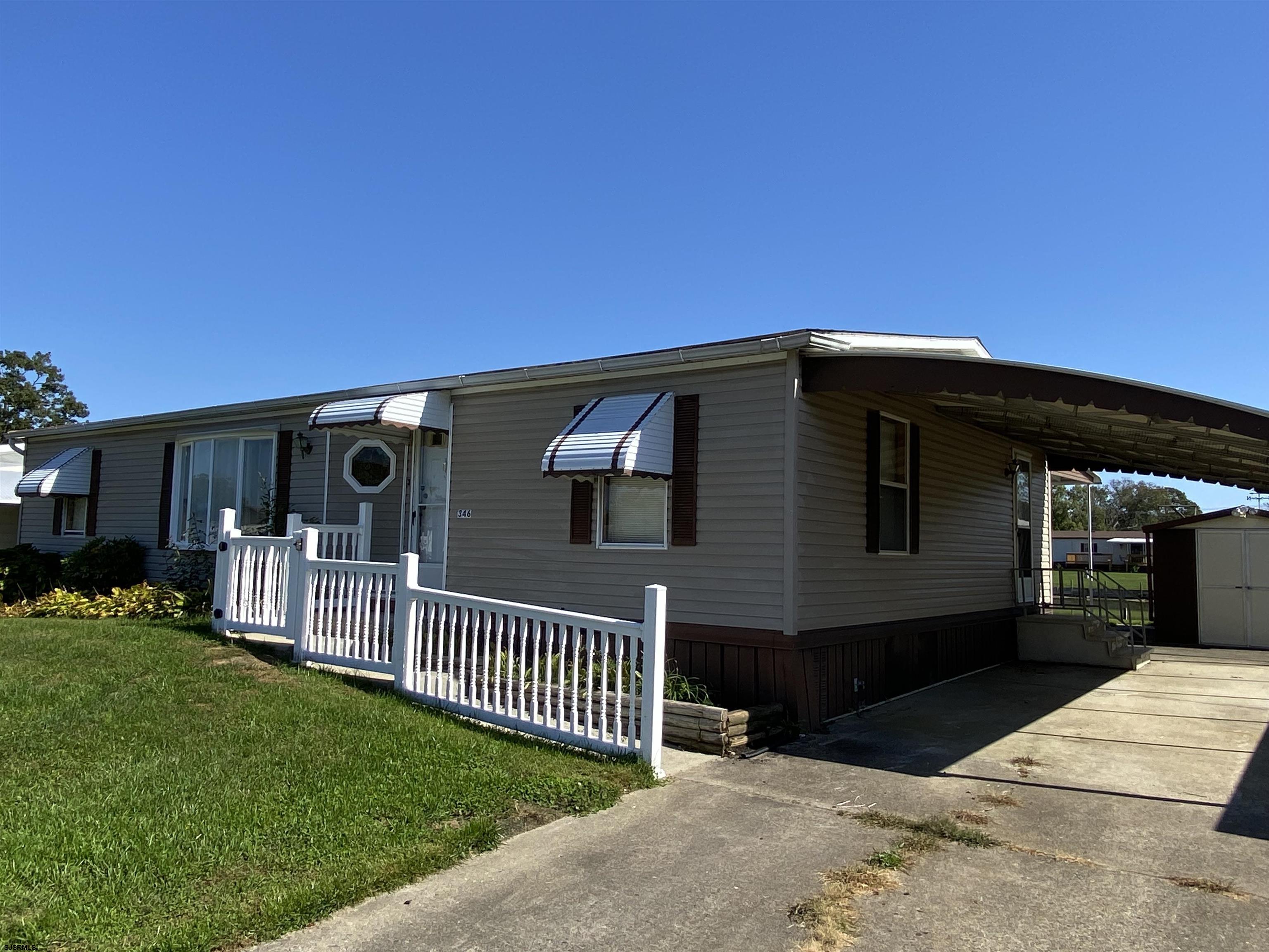 346 Puritan Drive Buena, NJ 08310 - Photo 2 of 22 a view of a house with a yard