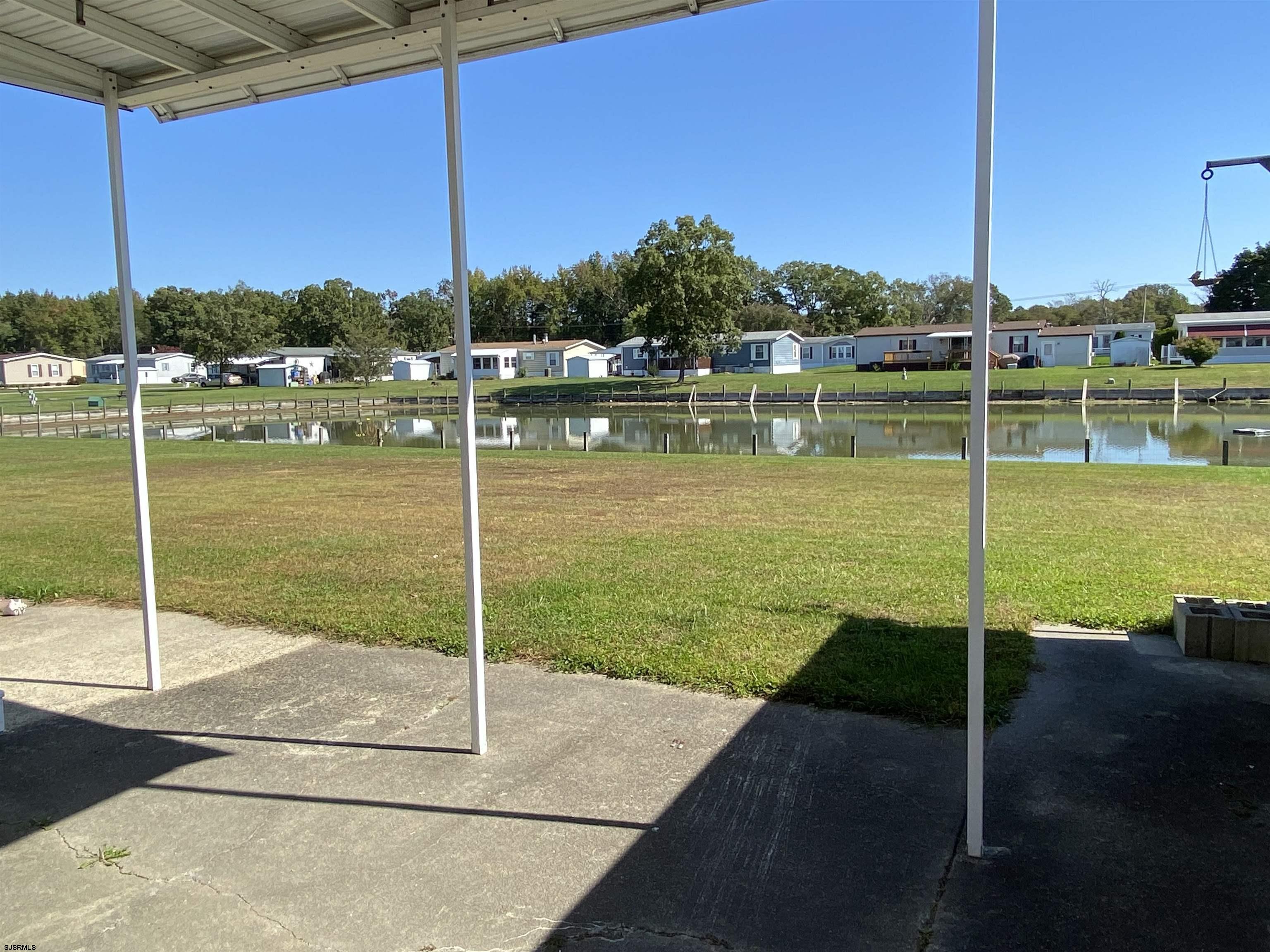 346 Puritan Drive Buena, NJ 08310 - Photo 5 of 22 a view of a table and chairs in the patio