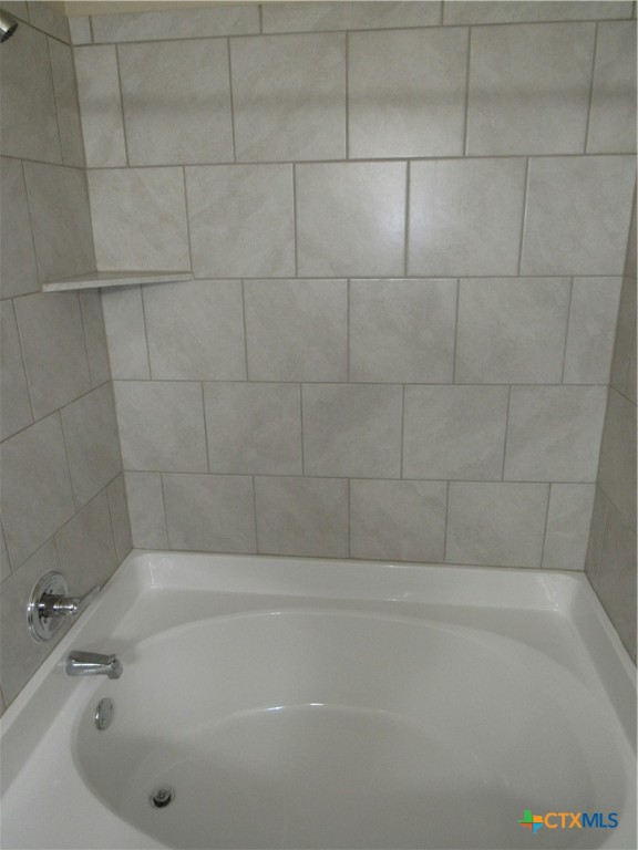 1108 Stealth Lane, Unit A Killeen, TX 76549 - Photo 12 of 21 a bathroom with a bathtub
