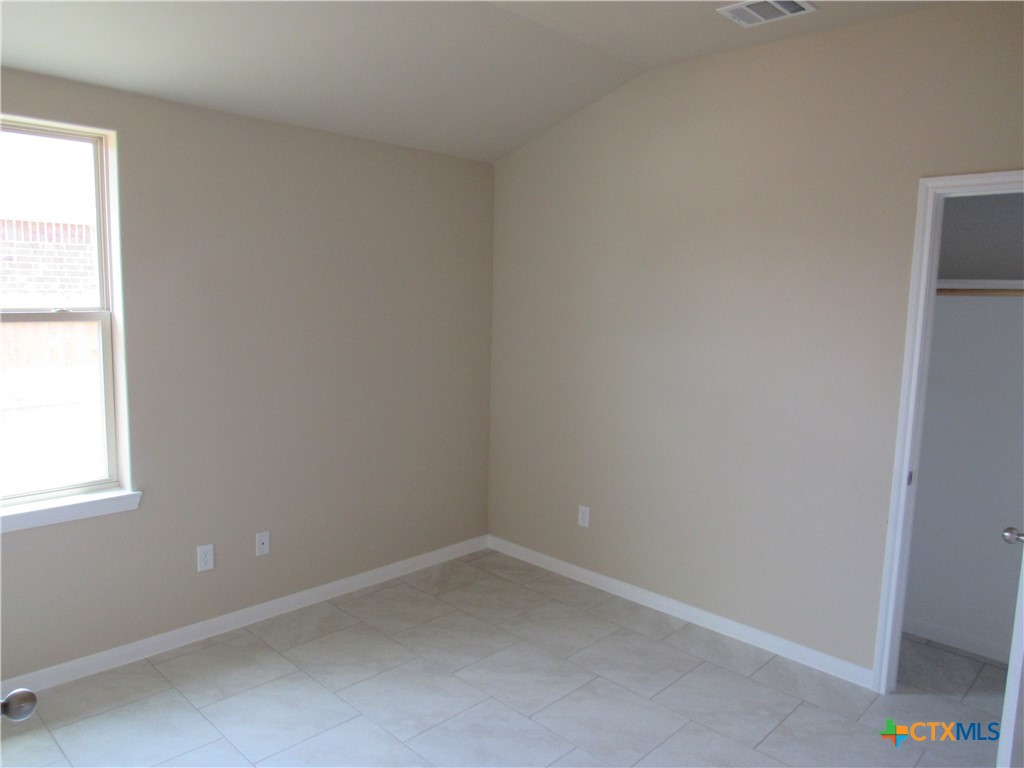 1108 Stealth Lane, Unit A Killeen, TX 76549 - Photo 20 of 21 an empty room with a window