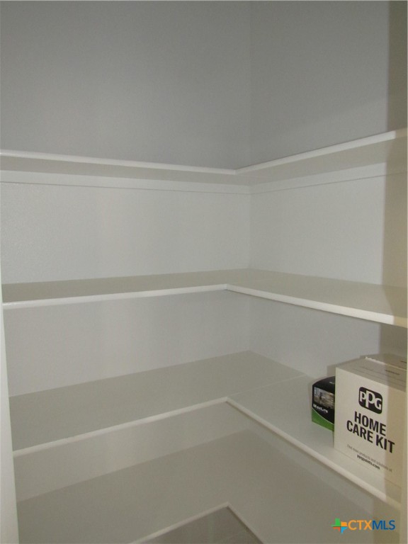 1108 Stealth Lane, Unit A Killeen, TX 76549 - Photo 8 of 21 a view of a closet with wooden floor