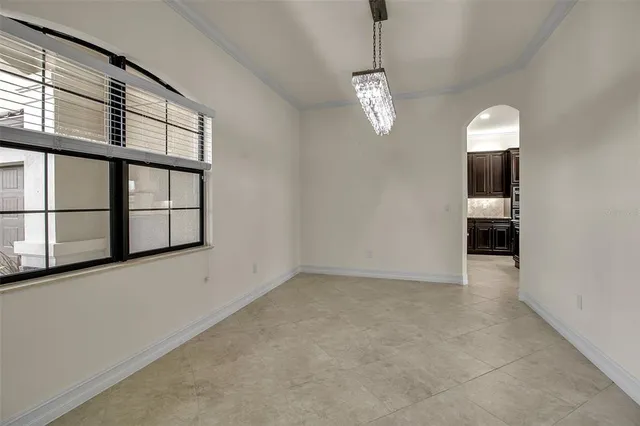 an aerial view of a house with a garden