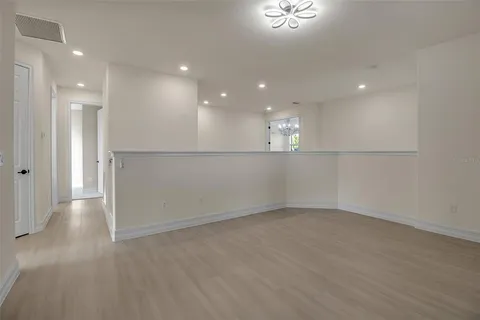 wooden floor and windows in an empty room
