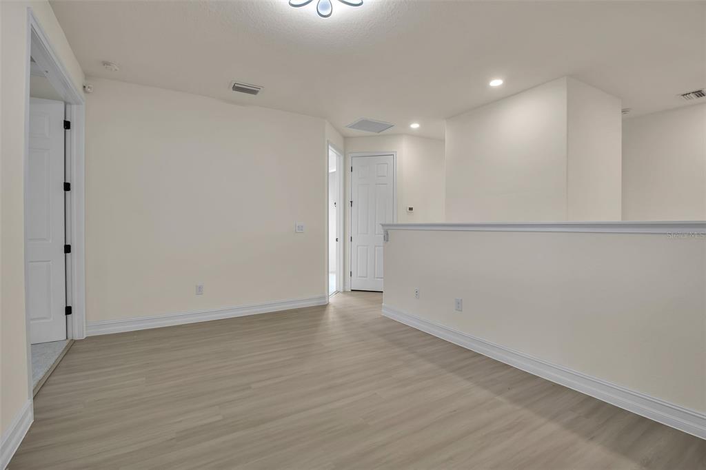 5609 Arnie Loop Lakewood Ranch, FL 34211 - Photo 33 of 64 a view of an empty room