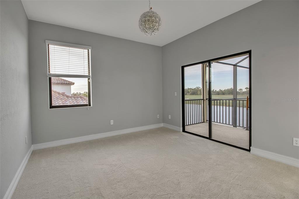 5609 Arnie Loop Lakewood Ranch, FL 34211 - Photo 39 of 64 an empty room with windows