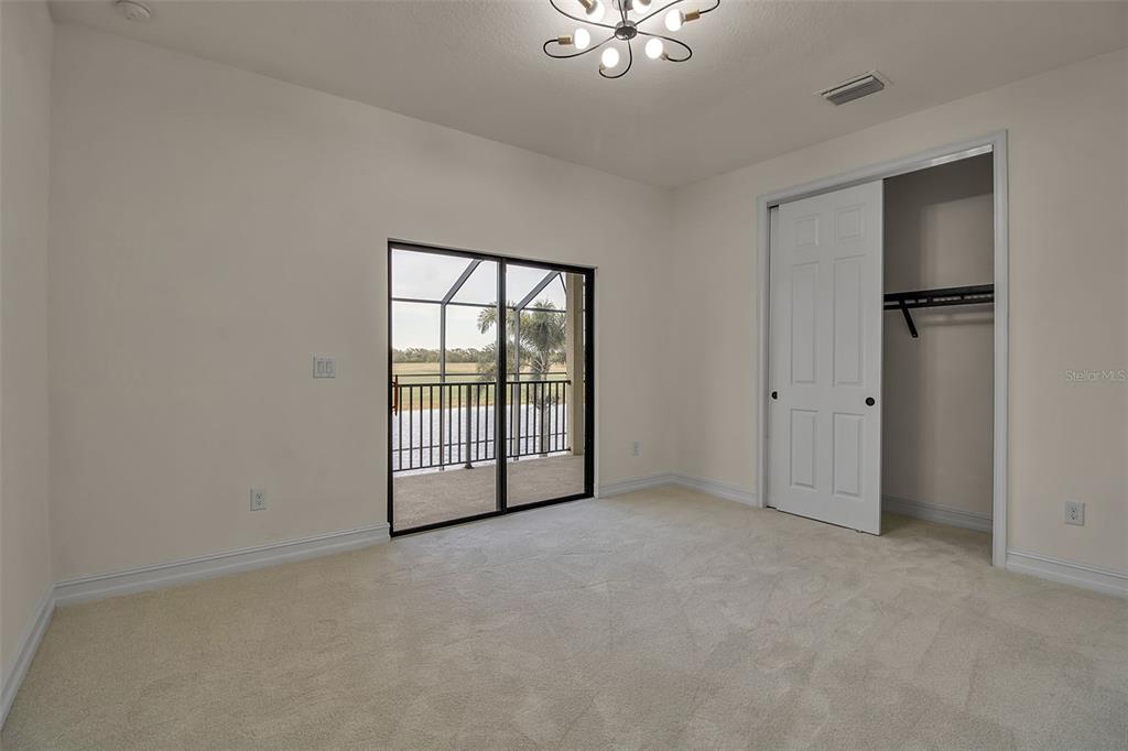5609 Arnie Loop Lakewood Ranch, FL 34211 - Photo 43 of 64 a view of an empty room with a window
