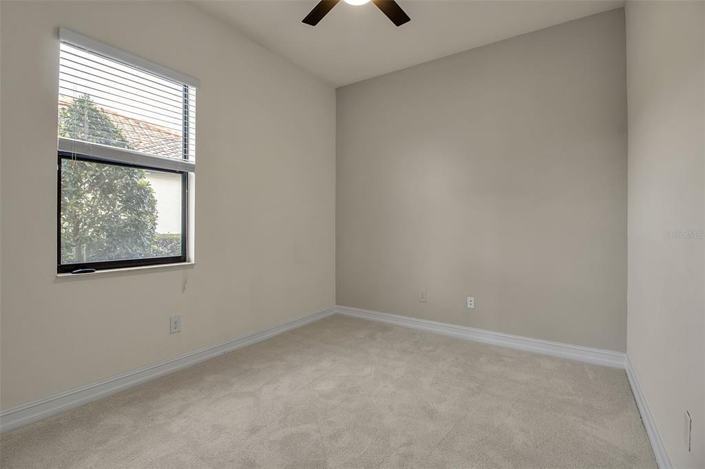 5609 Arnie Loop Lakewood Ranch, FL 34211 - Photo 47 of 64 an empty room with a window