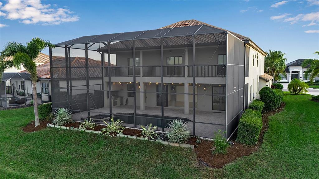 5609 Arnie Loop Lakewood Ranch, FL 34211 - Photo 58 of 64 a view of a back yard