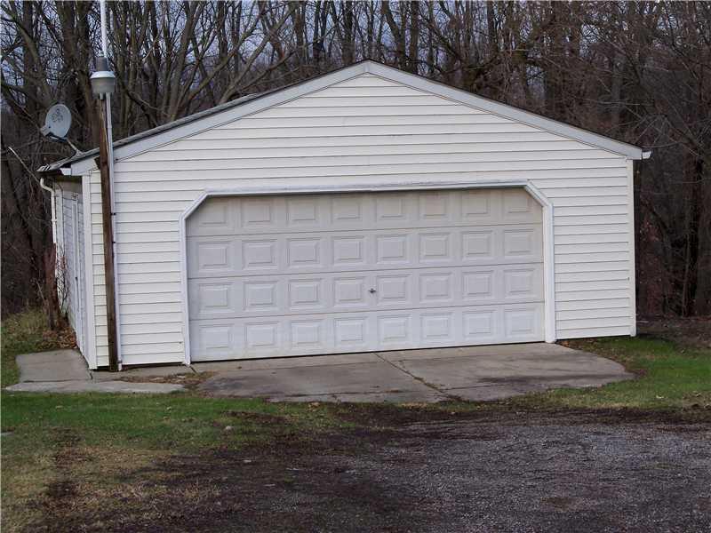 7961 Franklin Road Evans City, PA 16033 - Photo 2 of 19 Parking Lot/Garage. 2 Car garage with 220 amp service