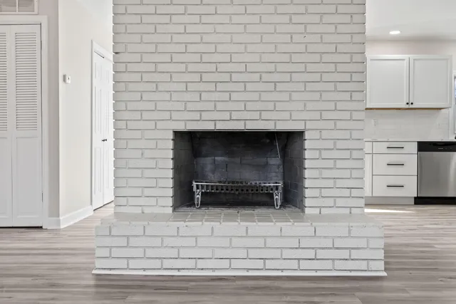 a living room with a fireplace