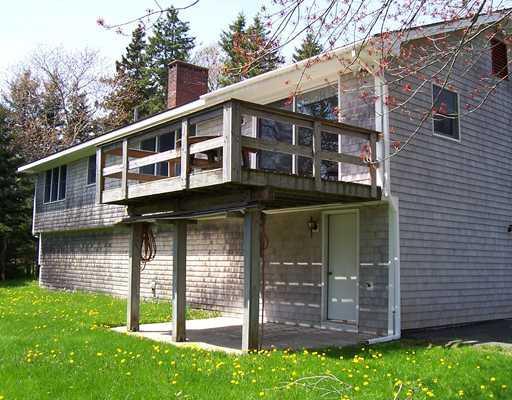 3 Barter Point Road Tenants Harbor, ME 04860 - Photo 2 of 13 Exterior Back. Deck and patio with...