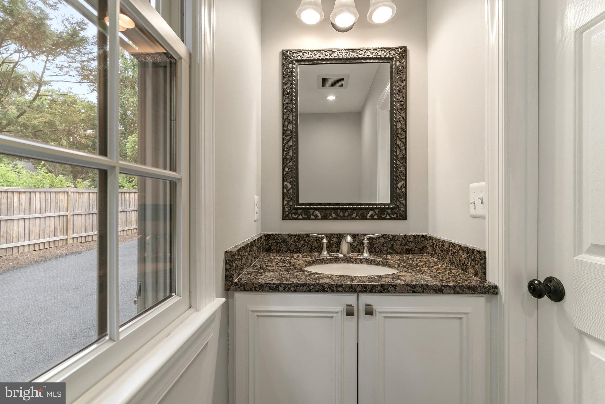7323 Arrowood Road Bethesda, MD 20817 - Photo 21 of 64 Powder room next to office