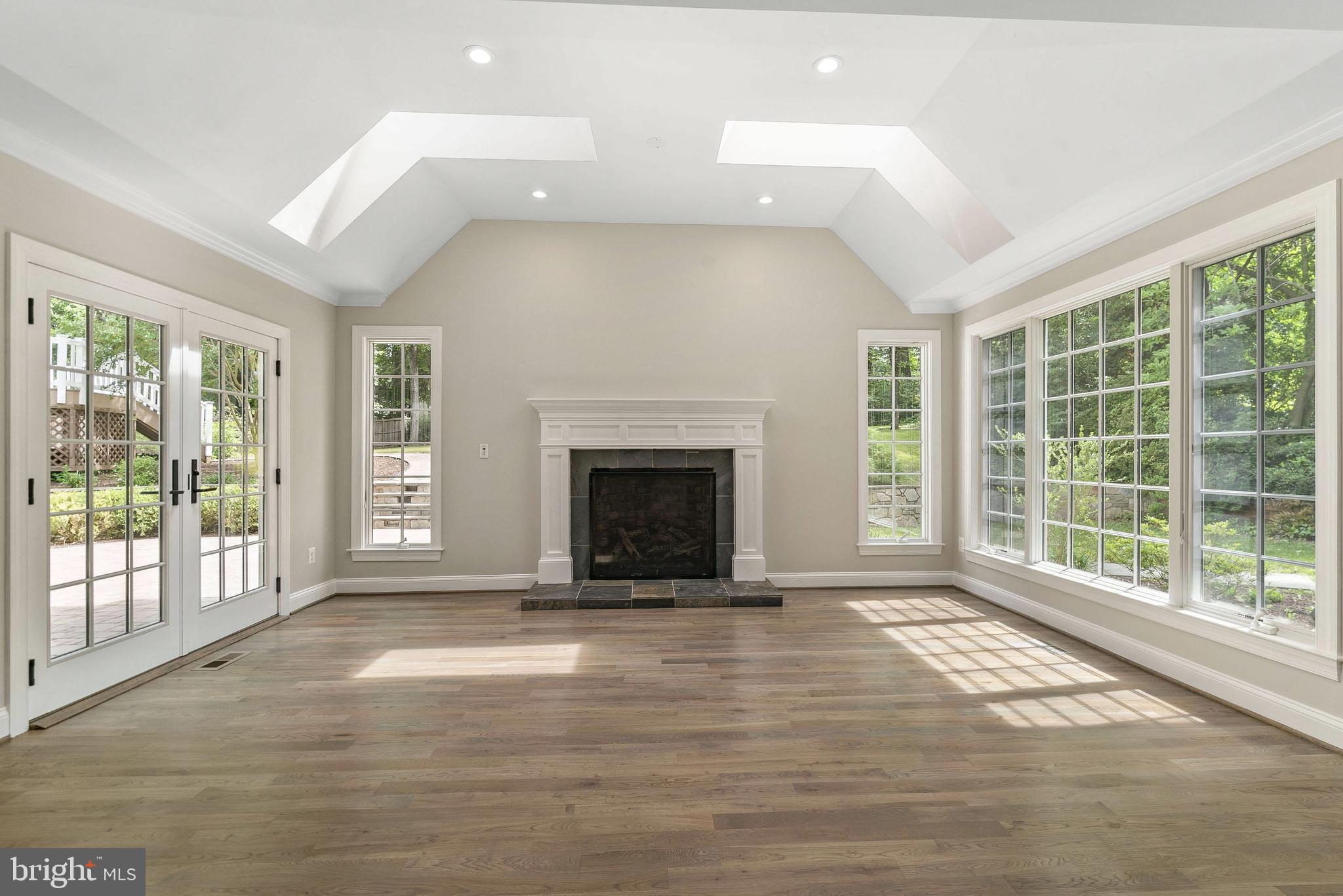 7323 Arrowood Road Bethesda, MD 20817 - Photo 8 of 64 Great room with great views of the yard!