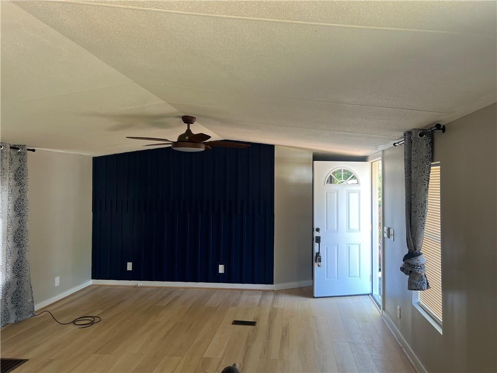 511 Chapel Hill Road Manchester, GA 31816 - Photo 2 of 7 wooden floor in an empty room