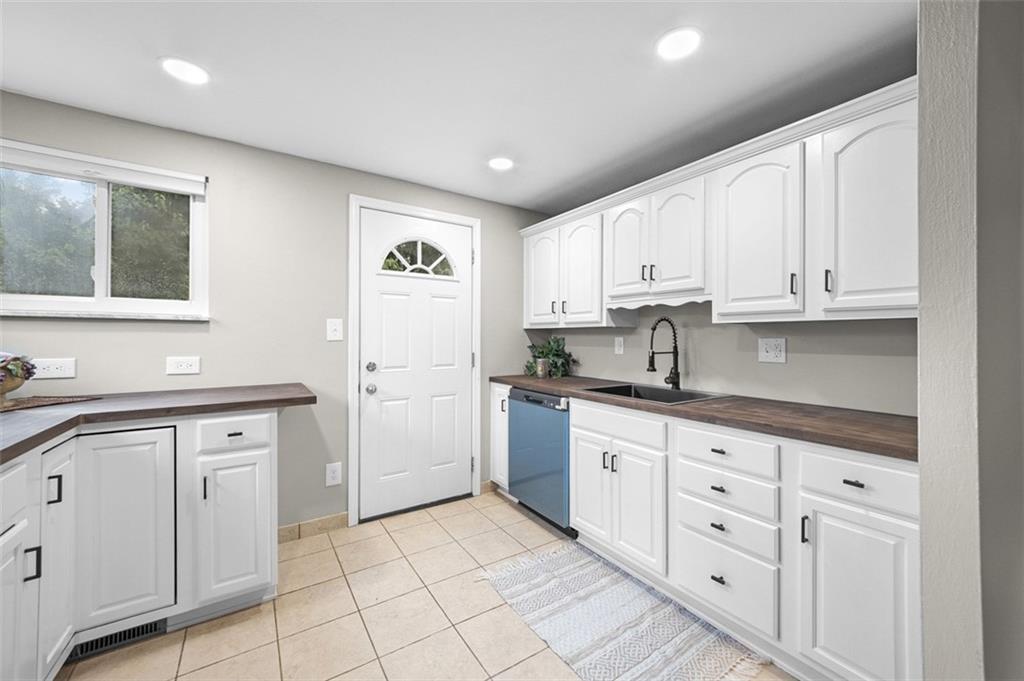359 Hochberg Road Monroeville, PA 15146 - Photo 16 of 30 a kitchen with white cabinets