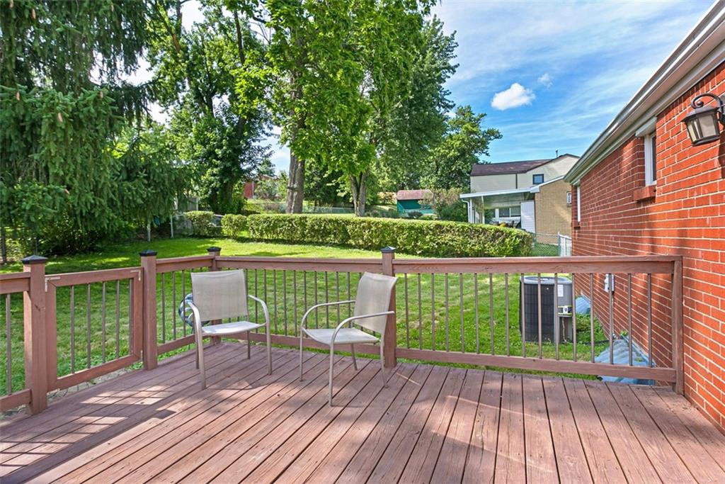 359 Hochberg Road Monroeville, PA 15146 - Photo 5 of 30 a view of house with deck outdoor seating and green space