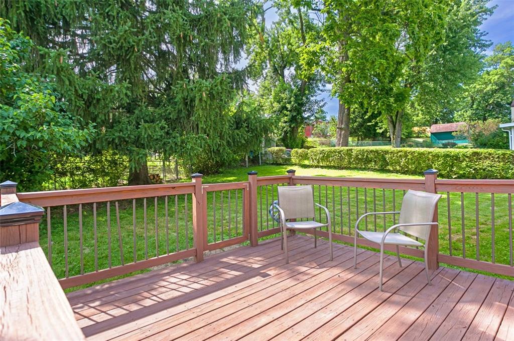 359 Hochberg Road Monroeville, PA 15146 - Photo 6 of 30 a view of a deck with two chairs and wooden floor