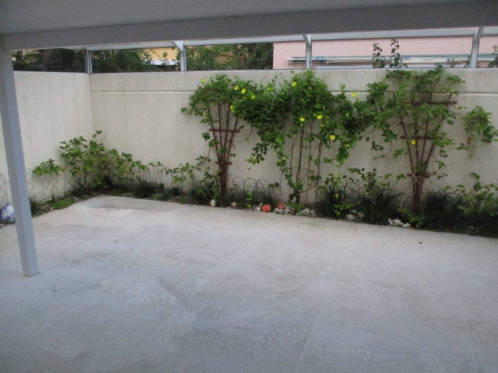 57 Laurel Oaks Circle Tequesta, FL 33469 - Photo 13 of 18 a view of a backyard