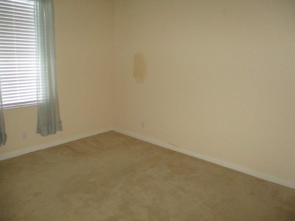 57 Laurel Oaks Circle Tequesta, FL 33469 - Photo 9 of 18 a view of an empty room and a window