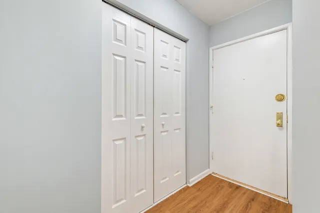 a view of a livingroom with wooden floor