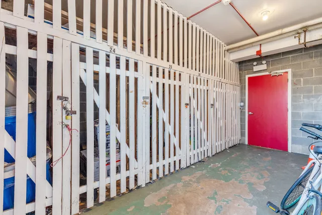 a view of a room with wooden walls