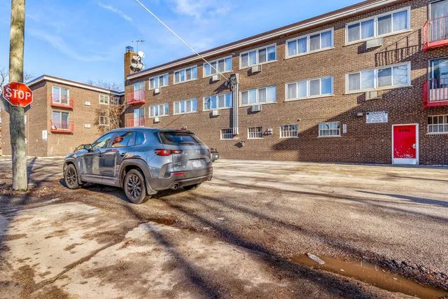 a car parked in front of a building