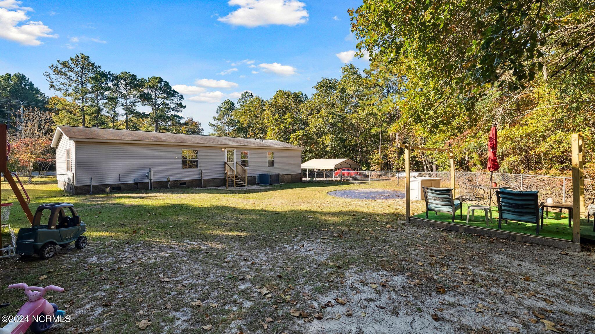 704 Micro Tower Road Lillington, NC 27546 - Photo 25 of 28 Backyard
