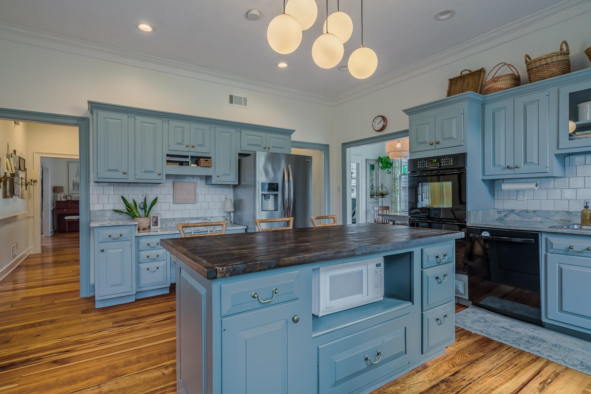 810 West Tree Cove Collierville, TN 38017 - Photo 11 of 25 a kitchen with stainless steel appliances granite countertop a stove and cabinets