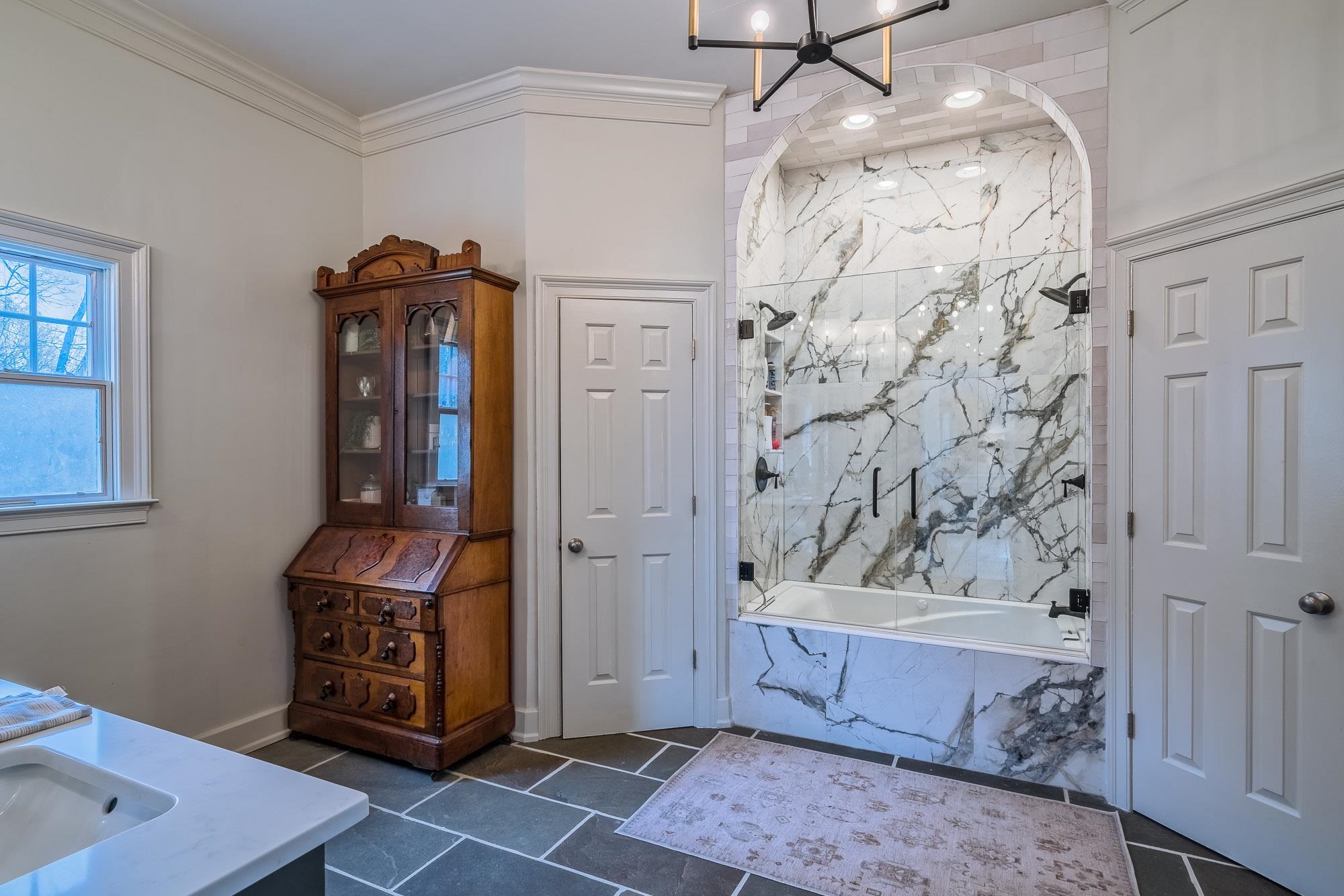 810 West Tree Cove Collierville, TN 38017 - Photo 15 of 25 a bathroom with a bathtub and shower