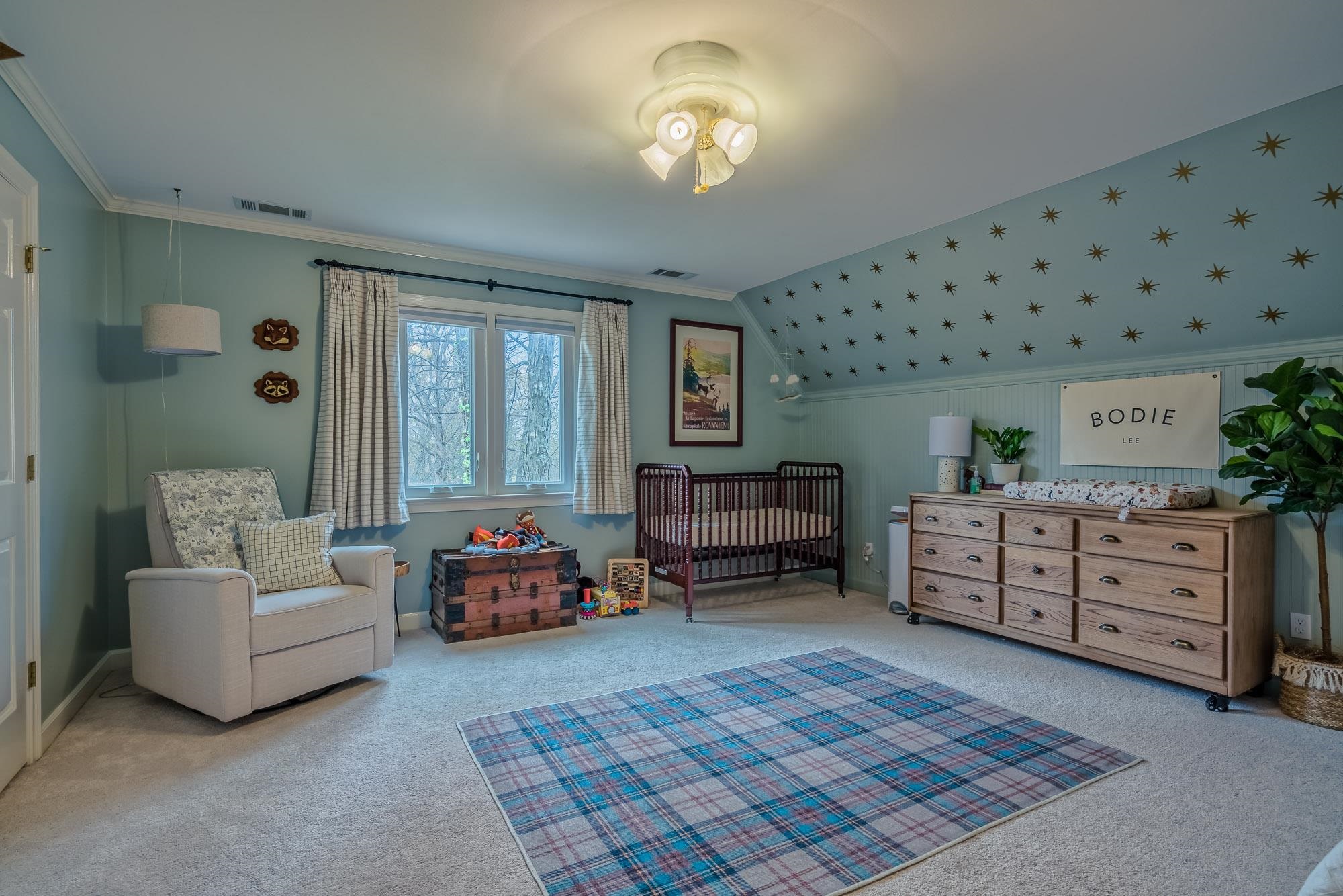 810 West Tree Cove Collierville, TN 38017 - Photo 20 of 25 a bedroom with furniture and a large window
