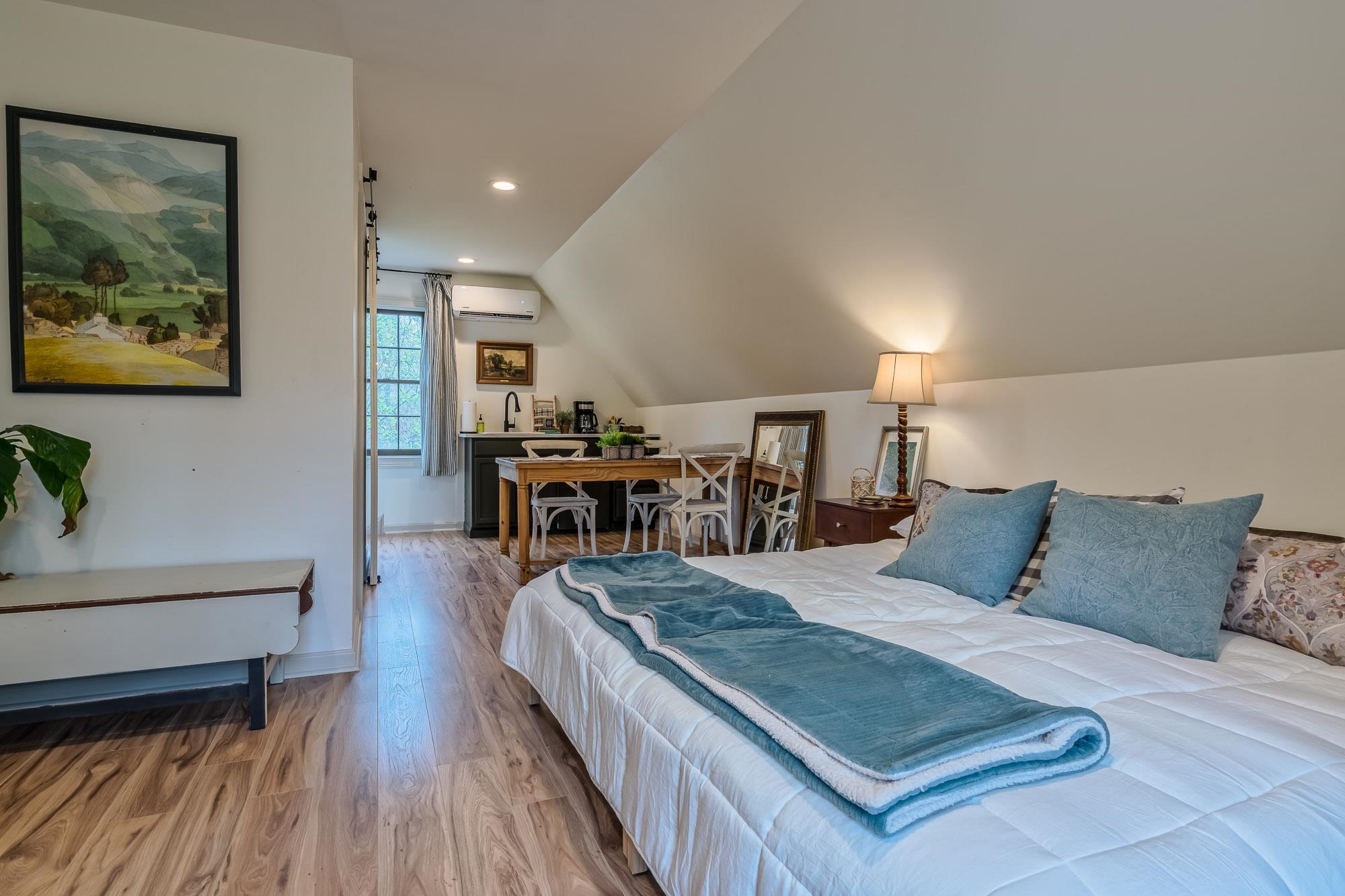 810 West Tree Cove Collierville, TN 38017 - Photo 24 of 25 a bed room with a bed and paintings on the wall