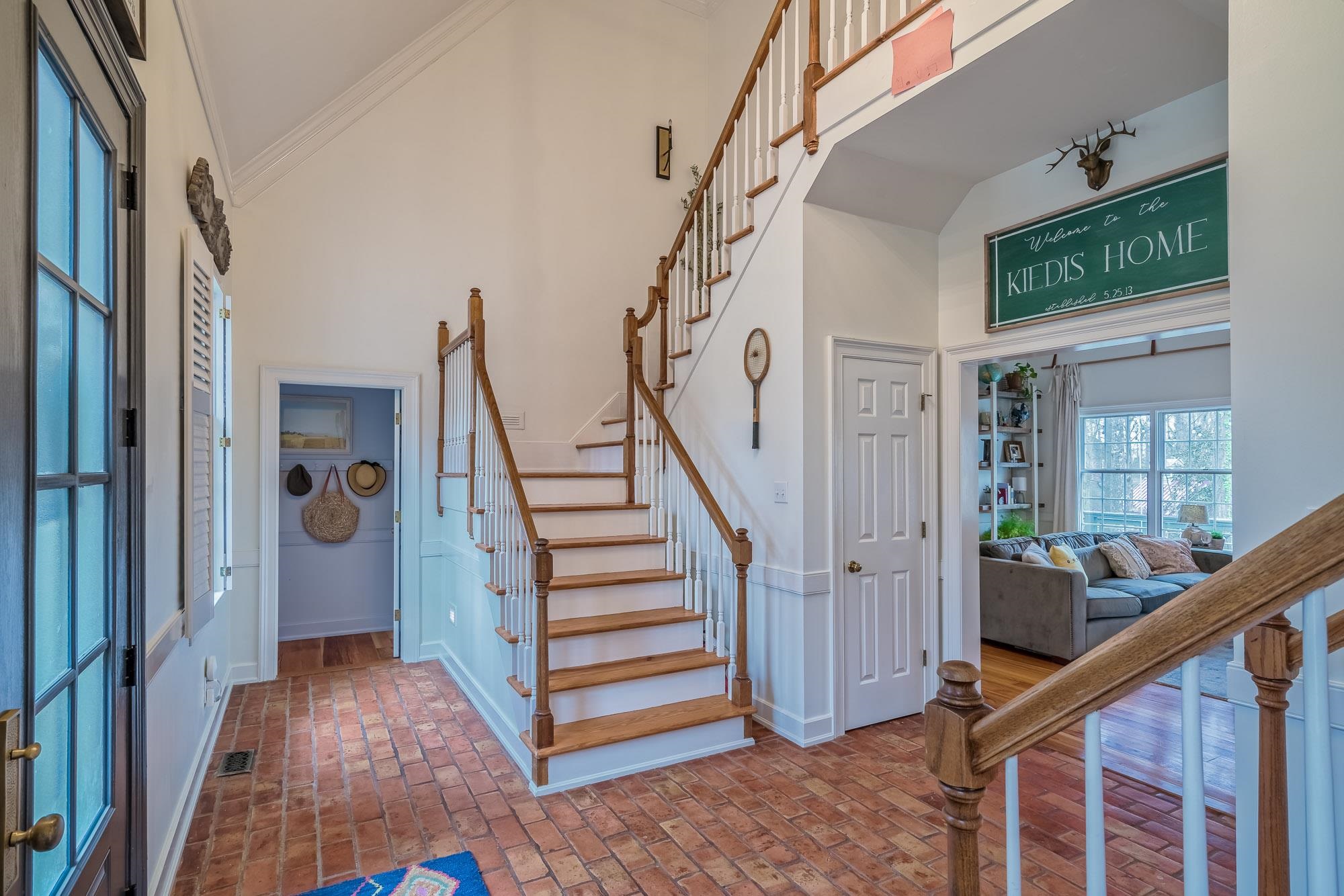 810 West Tree Cove Collierville, TN 38017 - Photo 3 of 25 a view of entryway with wooden floor and stairs